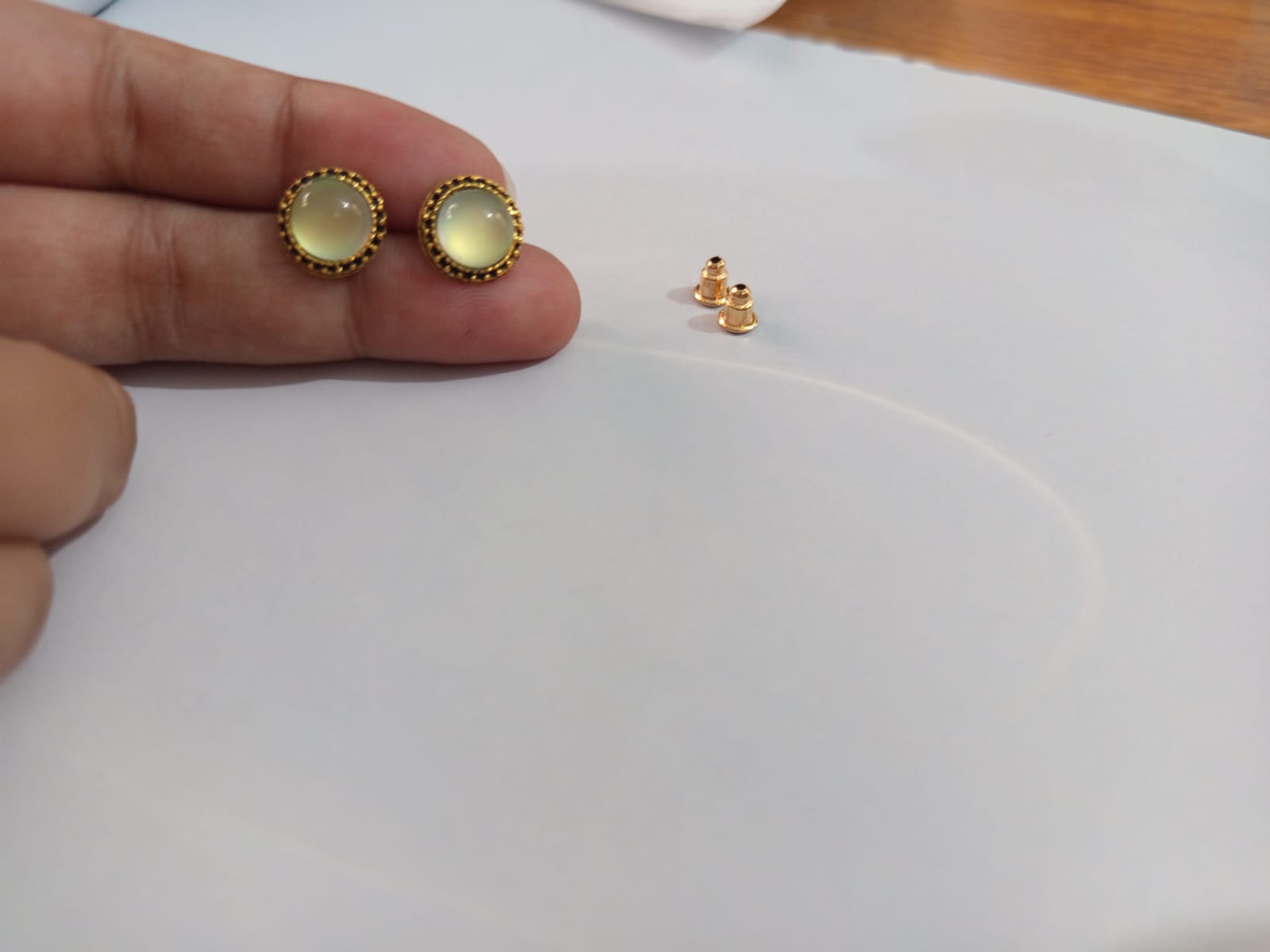 Round light green studs