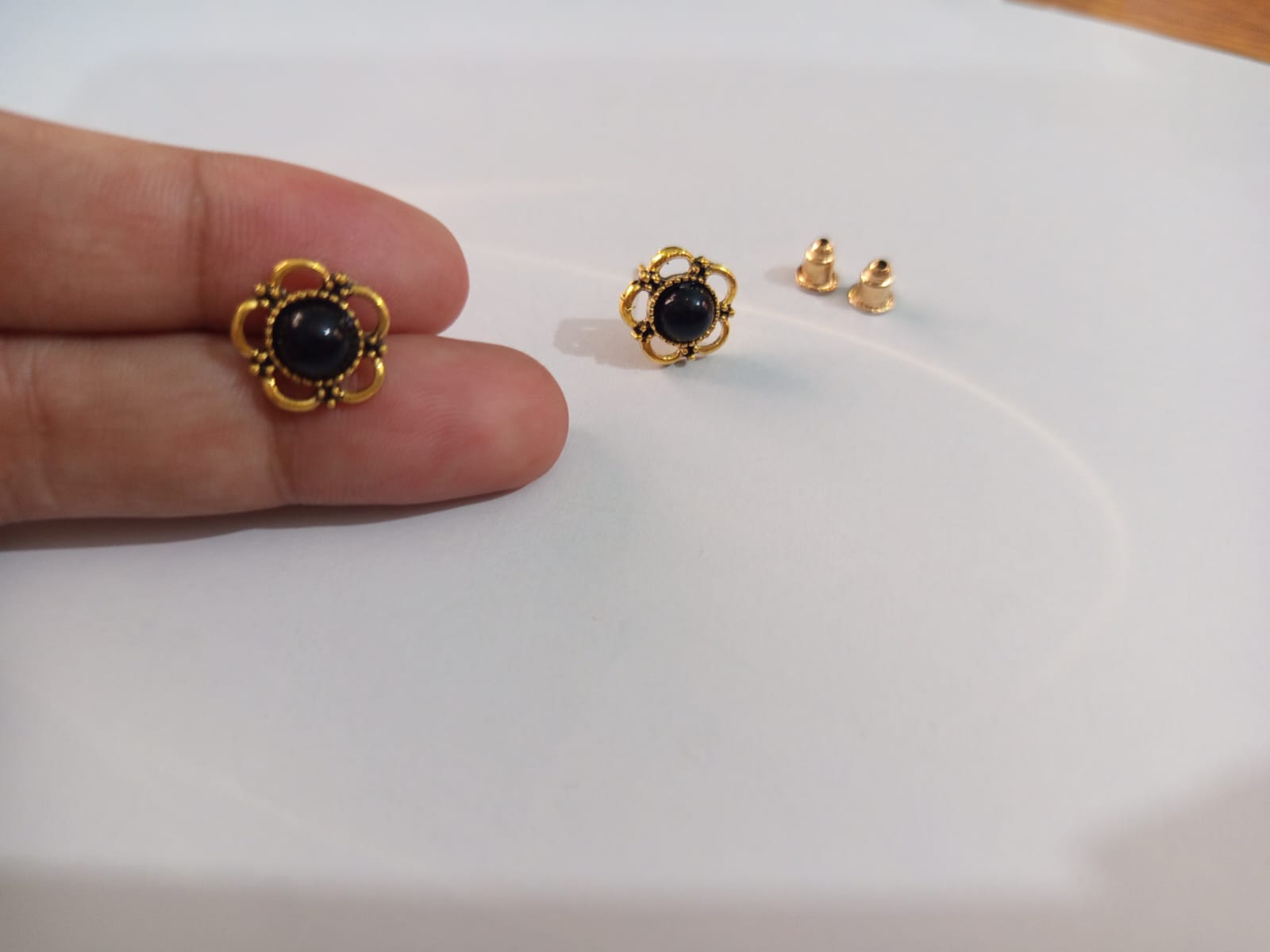 Black floral stud