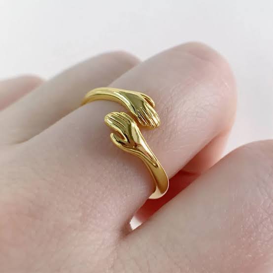 Two-Piece Women's Jewelry Set Featuring a Design of Hands Holding Each Other